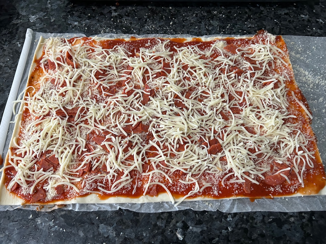 puff pastry with parmesan, pepperoni, and mozzarella