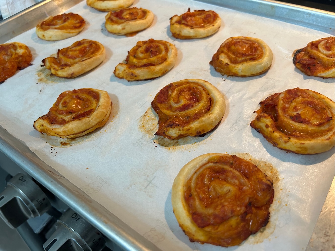 fresh from the oven, baked puff pastry pizza pinwheels