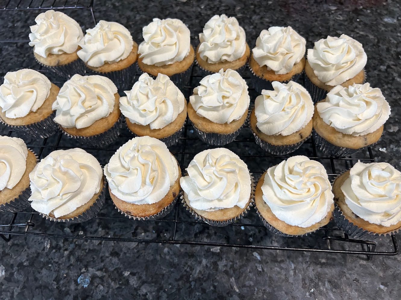 cupcakes frosted with white swirls