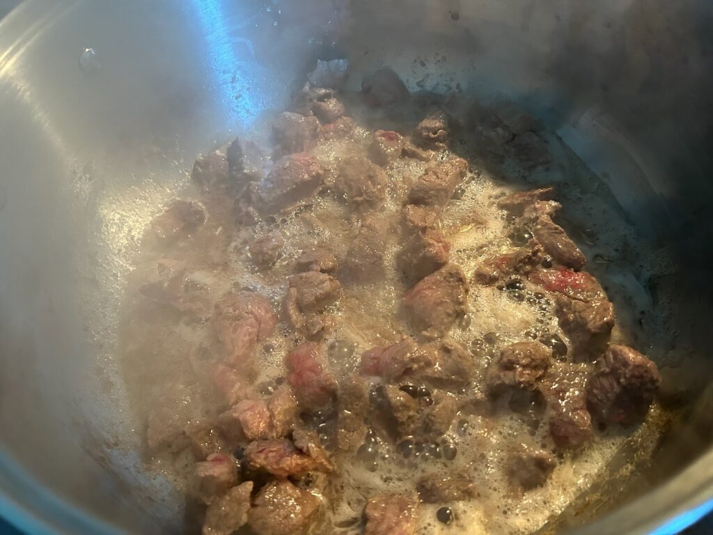 Rustic Italian Beef Stew meat in pan