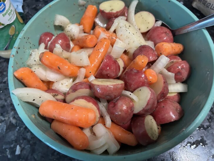 Tuscan Roasted Chicken and Veggies (pic of veggies in bowl coated in italian dressing)